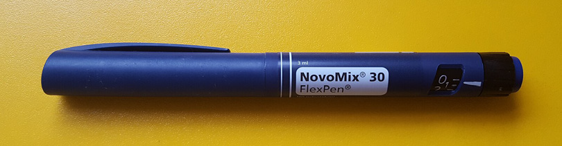 Figure 18. The Novopen is a discreate device for injecting insulin.Source: Wesalius (2018). Insulin analog 100 IU-1ml novomix pen yellow background[Photograph]. &nbsp;Wikimedia Commons. CC BY 4.0.